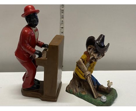 A vintage ceramic figure and a wooden figure of a cowboy 