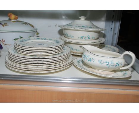 A Myott dinner service having two lidded vegetable dishes, gravy boat and saucer, a meat plate, six side plates, six sweet pl