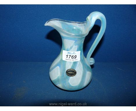 A glass Jug from Langsworthy, Cornwall, light blue swirls, 6" tall.