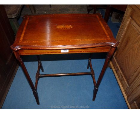 A rectangular Edwardian occasional Table having light and darkwood stringing and crossbanding and central shaded inlaid oval 