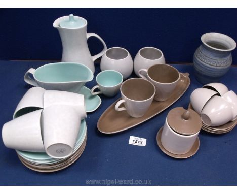 A quantity of Poole Pottery Tableware including cups and saucers, sauce jug, saucer, coffee pot etc.