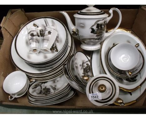 An Oriental Kutani part Dinner/tea set with four cups, four saucers, four tea plates, four small bowls, eight larger bowls, e