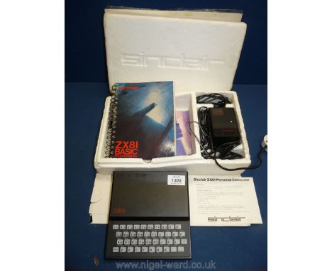 A Sinclair ZX81 personal Computer in original box and includes; manual, leads, etc. (box a/f)