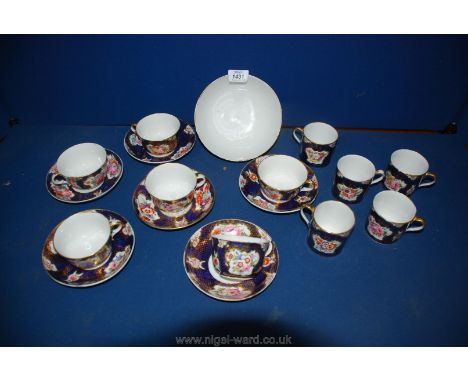 An unusual early Coalport part coffee and tea service, possibly an unrecorded pattern:  six teacups, five coffee cans, six sa