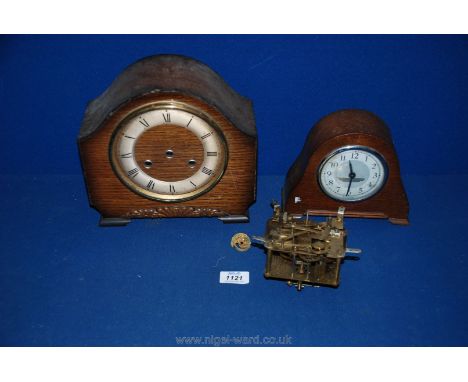 A Bentima mantle clock case with Roman numerals, workings are separate, along with a smaller clock with Arabic numerals.