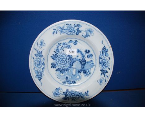 A good English Delftware charger painted with flowers;  mid 18th century;  basically in very good condition. 12 7/8" diameter