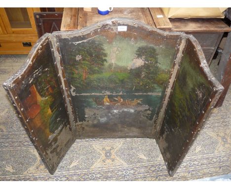 A tryptic Firescreen, the ebonised frame with an oil painted scene of a shire horse drawn wagon traversiing a river near a ho