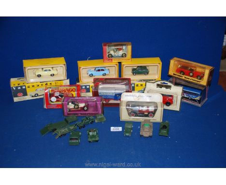 A quantity of Die-Cast cars to include; Vanguard, Matchbox, army models, etc. Mint and boxed.