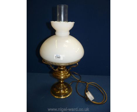 An Oil lamp converted to electric with white shade, 19 3/4'' tall overall approx.