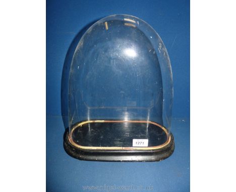 A glass Dome with base. 14" tall including base and 12" wide overall, ideal for clock.
