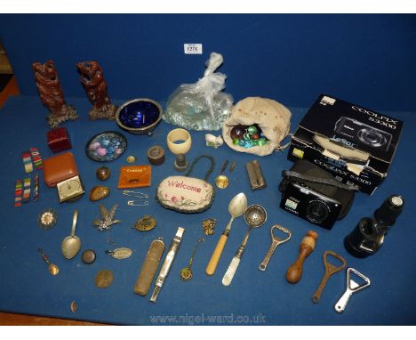 A quantity of miscellanea including two wooden oriental figures, cased whistle, RAF badges, jewellery boxes, Army stripes, sp