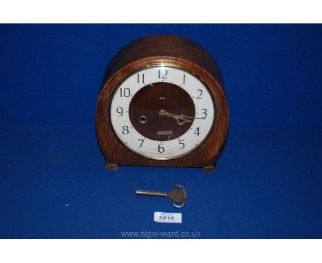 A 1930's Oak Smiths mantle Clock, with key, 7 1/2'' tall x 8'' wide