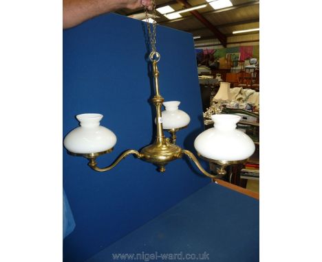 A brass tree branch Electrolier with oil lamp style shades.
