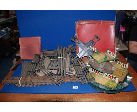 A good quantity of Hornby 'O' gauge 1950's rails, turntables, level crossings etc many in original boxes.