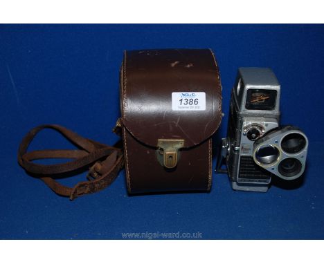 A G.B. Bell &amp; Howell Autoset turret 8mm Cine Camera with rotating lenses and original case.