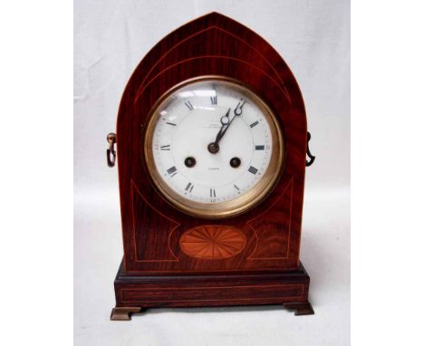 An Edwardian inlaid rosewood Mantel Clock of lancet form, circular white enamel dial with Roman numerals inscribed Dent 33 Co