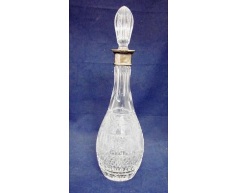 A mid-century cut glass Decanter of ovoid bottle shape, hallmarked silver collar Birmingham 1957, engraved with repeating vin