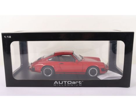 Autoart Millennium Porsche 911 Carrera 1988, 1:18 Scale, red diecast body, in mint pre owned condition, outer window display 