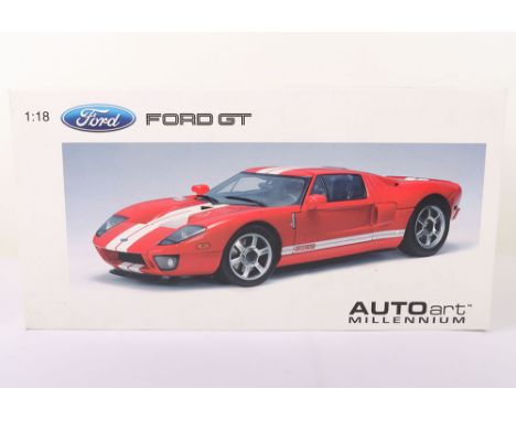 Autoart Millennium Ford GT, 1:18 Scale, red diecast body, white stripes, in mint pre owned condition, has been on display, po