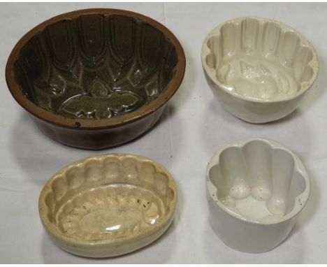 4 CERAMIC JELLY MOULDS 