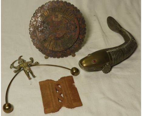 TREEN TRIBAL COMB, BRASS ARTICULATED FISH,PERPETUAL CALENDER & BALANCING INDIAN JESTER  