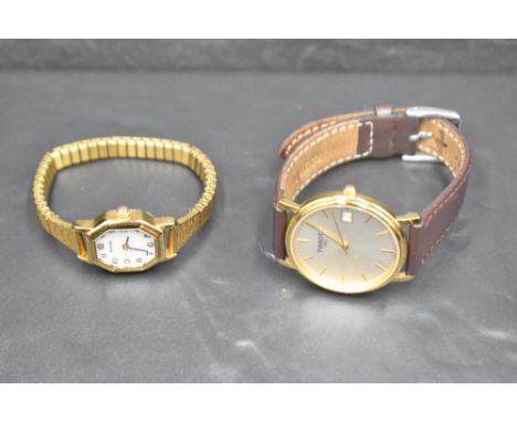A gent's Tissot 1853 wrist watch model no:T870/970 having baton numeral dial and date aperture to pearlised face in gold plat