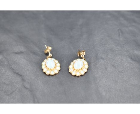 A pair of 9ct gold stud earrings having large opal cluster drops, approx 5g gross