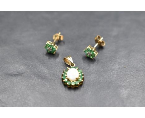 A pair of diamond and emerald style stone daisy cluster stud earrings with 9ct gold fittings and an emerald and opal cluster 