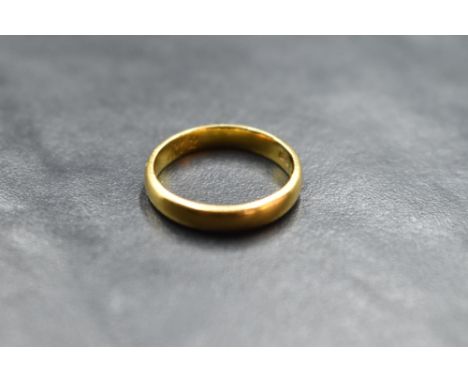 A Victorian 22ct gold wedding band bearing date inscription of 1872 inside, size K &amp; approx 3.5g