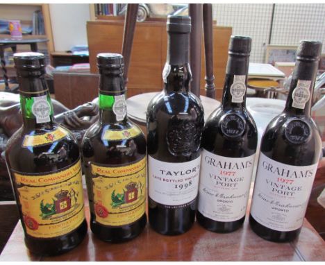 Two bottles of Graham's Port Vintage port 1977, a  Taylor's Vintage port 1998 and two bottles of Real Companhia Velha Tawny p