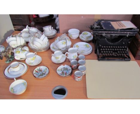 A Bell china part tea service together with other part tea set, a typewriter, suitcases, Thermos, National Geographic magazin