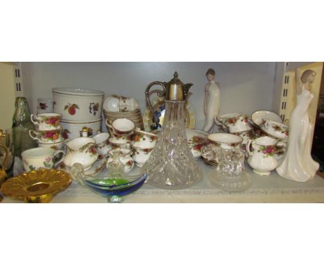 A large lot including a Royal Albert Old country roses pattern part tea service together with a claret jug, Nao figure, other