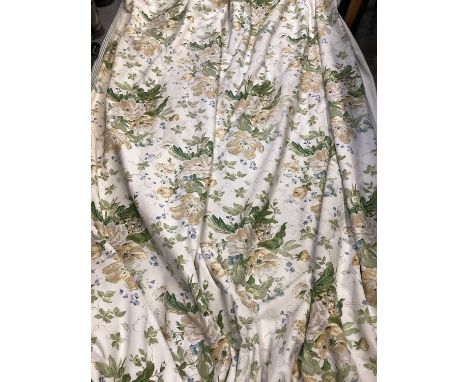 Pair cream and green floral curtains with gathered header, interlined and with possible blackout lining, with some sun damage