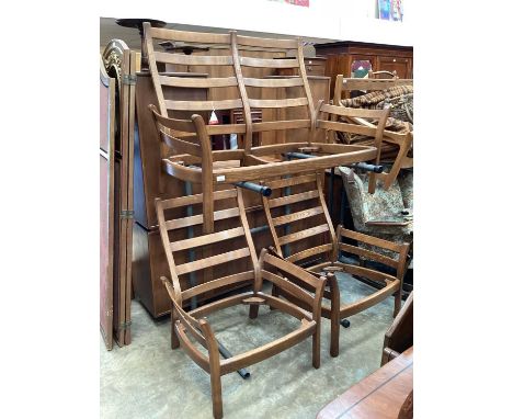 Ercol three piece suite together with a matching stool, plus a floral upholstered rocking chair (5)