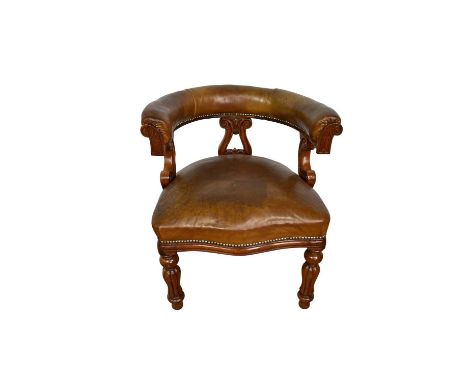 Victorian walnut and button closed mahogany tub chair, with lyre shape splat, raised on fluted baluster legs