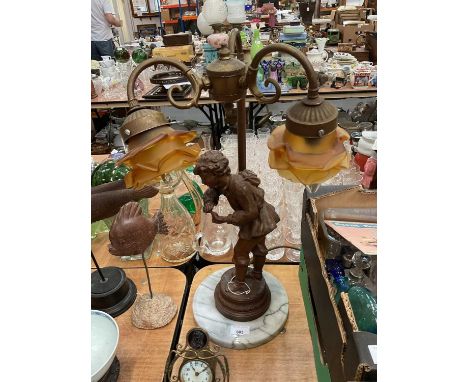 Bronzed resin figural table lamp, raised on marble base.