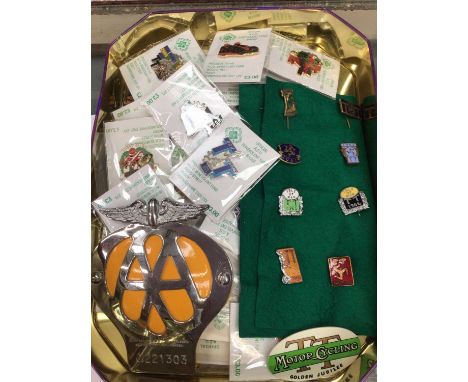Collection of TT racing enamel badges together with a vintage AA members badge  