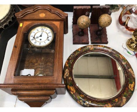 Wall clock, pair of globe book ends and a round wall mirror