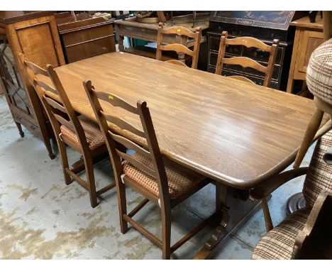 Ercol dining table and six chairs and a dresser