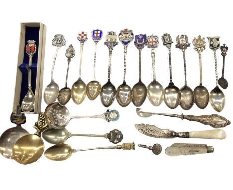 Group of mainly silver souvenir spoons, some plated, silver handled button hook, silver and mother of pearl fruit knife and b