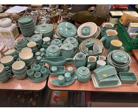 Extensive collection of Denby and Royal Doulton green glazed dinnerwares.Nine side plates 17cm diameter and one desert plate 