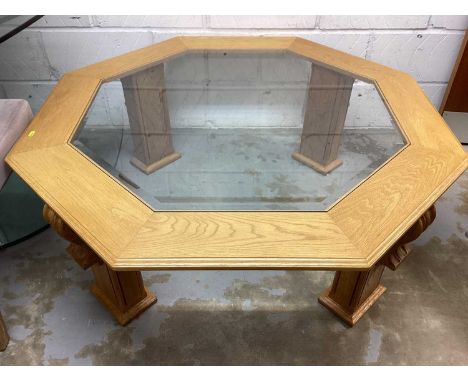 Good quality light oak octagonal coffee table with bevelled glass top, 120cm wide