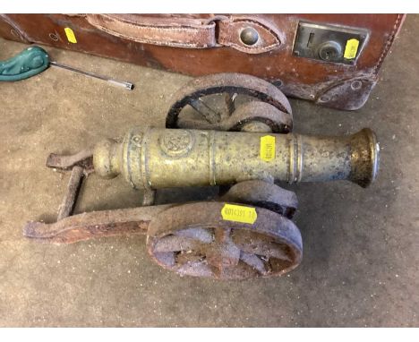 Old brass and iron model cannon, antique telescope, George III tea caddy, model of a fragment of a classical hand, and an old