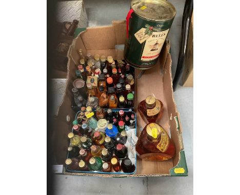 Bell's Christmas 1990 scotch whisky in box, two bottles of Dimple Scotch whisky, and a collection of approximately 70 miniatu