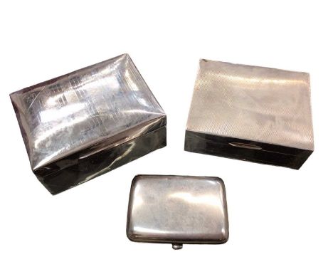 Two silver cigarette boxes and a silver cigarette case (3)