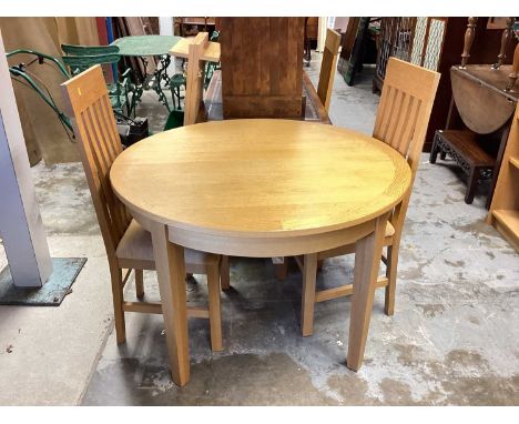 Mark Elliot light oak extending dining table with two extra leaves, 111cm diameter, leaves each measure 46.5cm, together with