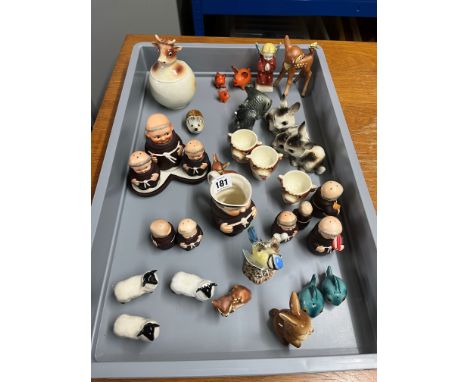 A group of Goebel novelty monk salt and pepper condiments etc also Goebel animal groups, egg cups, Beswick sheep.