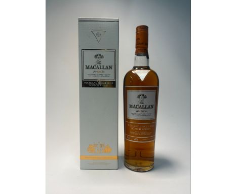 A bottle of The Macallan Amber Highland Single Malt Scotch Whisky, ‘Exclusively matured in sherry oak casks from Jerez, Spain