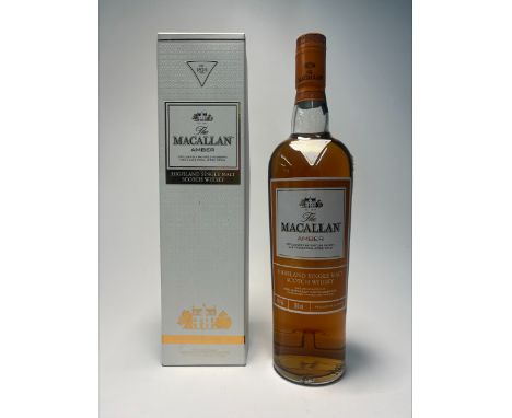 A bottle of The Macallan Amber Highland Single Malt Scotch Whisky, ‘Exclusively matured in sherry oak casks from Jerez, Spain