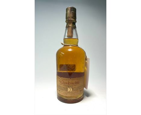 A bottle of Glenkinchie Lowland Single Malt Scotch Whisky, aged 10 years, distilled at the Glenkinchie Distillery in Pencaitl